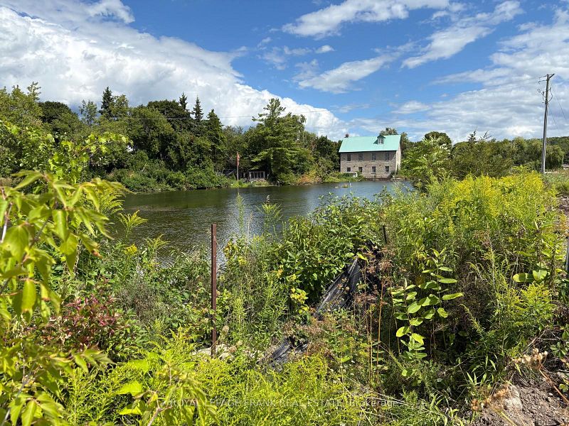 Mill Pond with the historic stone mill on the far shore